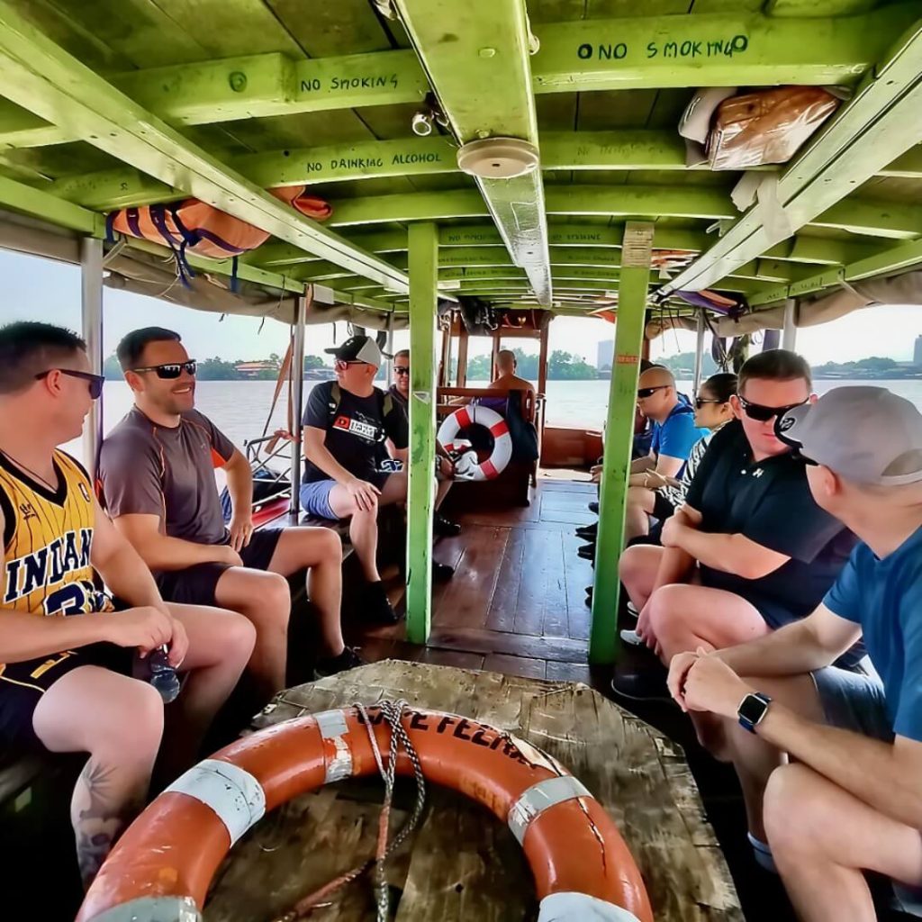 Guests on a local river boat returning from Bang Krachao across the Chao Phraya River