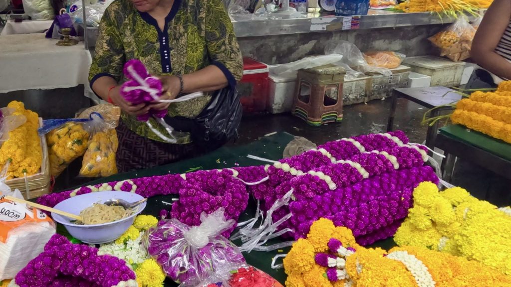 Globe Amaranth garlands being made