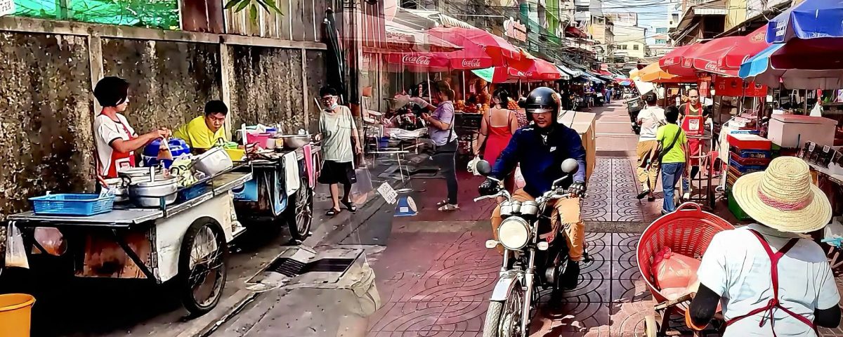 Cycling from Wat Hua Lamphong to Wat Mangkon showing quiet backstreet and busy Chinatown market street in Bangkok