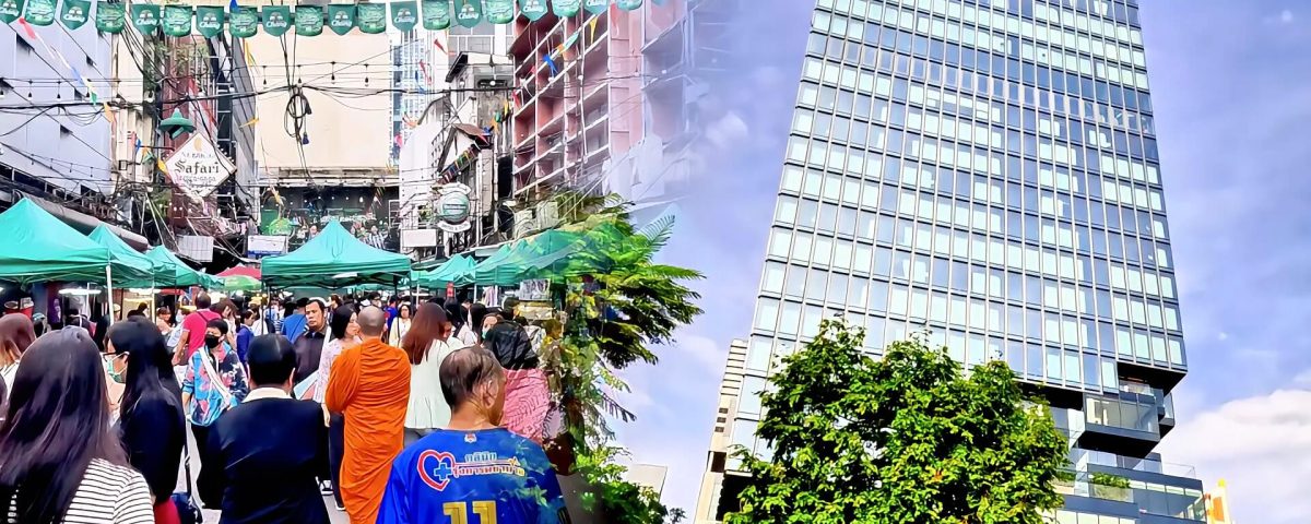 Cycling from Patpong market to Mahanakhon tower showing busy market street and view up the tower in Bangkok