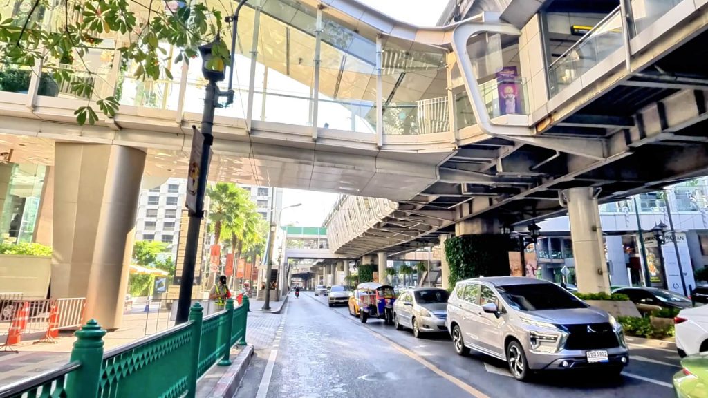 Cycling beside Gaysorn Centre in Bangkok's Ratchaprasong shopping district.