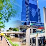 Cycling from Hua Lamphong to Siam Center showing canal path and stairs up to MBK walkway with BTS train in Bangkok