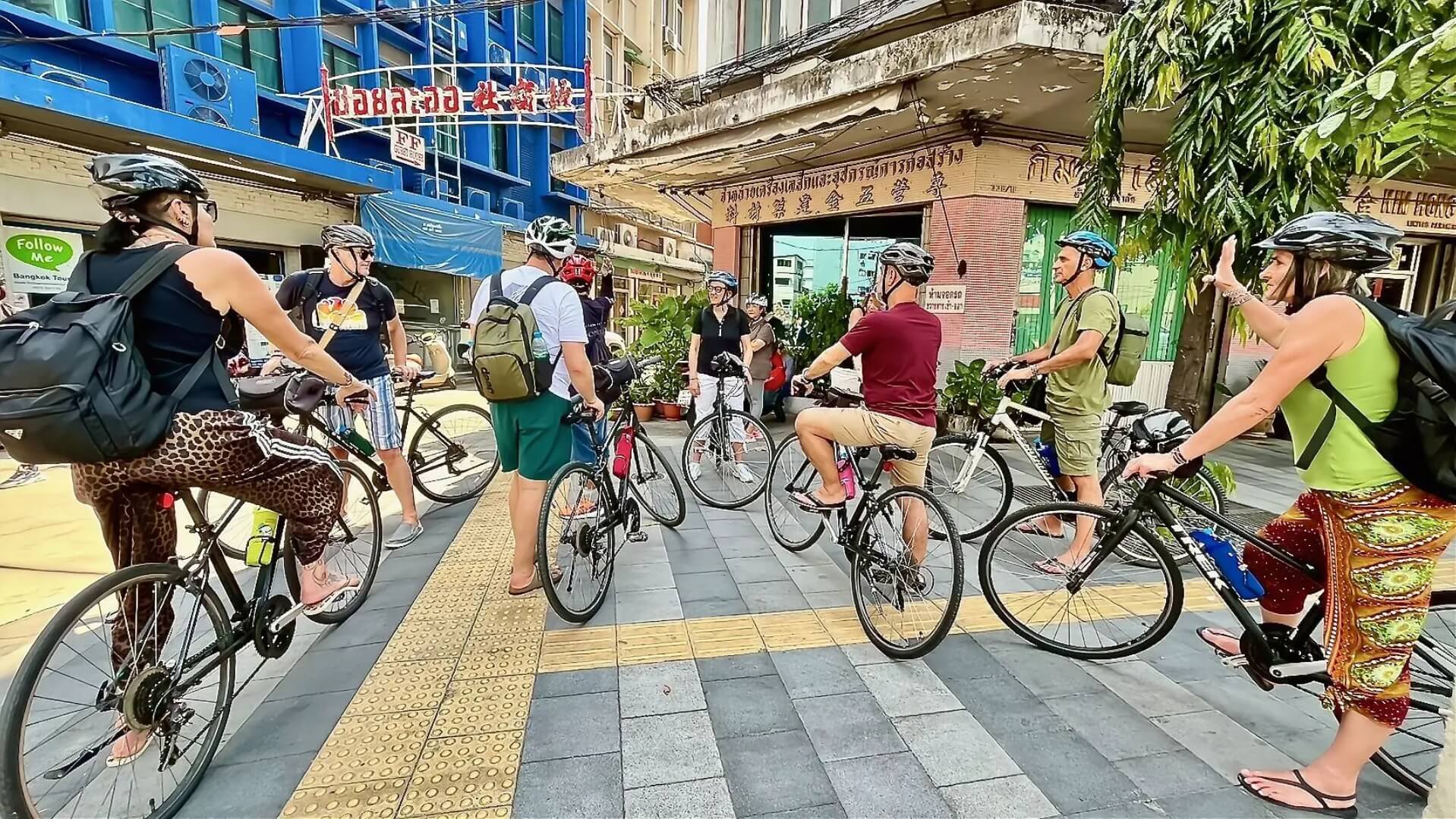 Guests preparing for a Bangkok bike tour with Follow Me Bike Tours