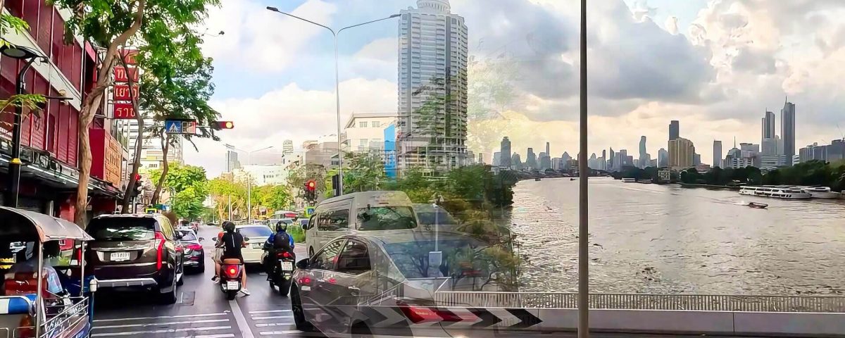 Split view of Silom Road traffic at a red light and the Bangkok skyline from Chao Phraya Sky Park