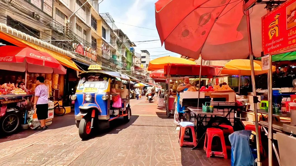 Busy market street near Yaowarat Road in Bangkok Chinatown