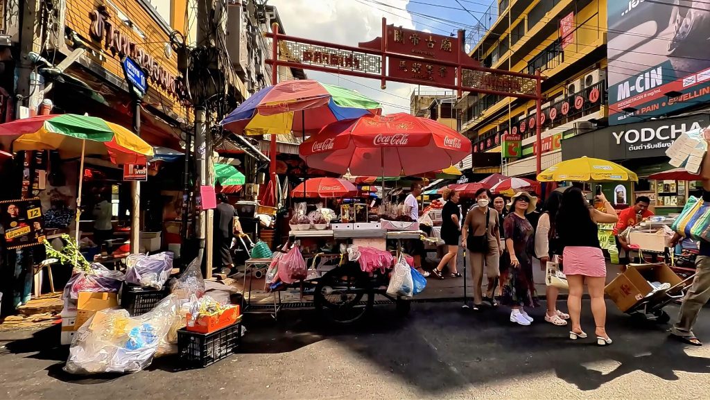 Market activity along Yaowarat Soi 11 in Bangkok Chinatown